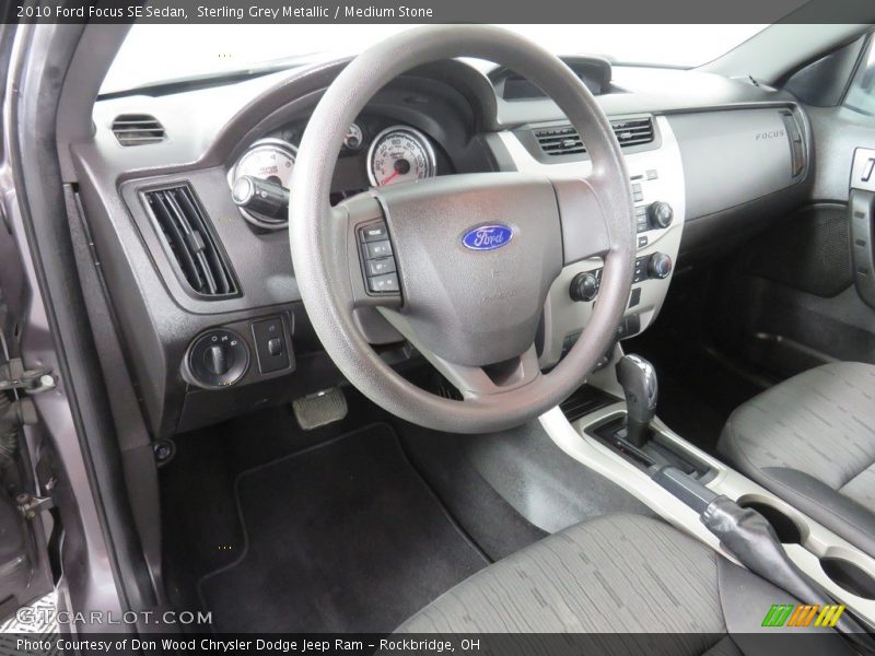 Sterling Grey Metallic / Medium Stone 2010 Ford Focus SE Sedan