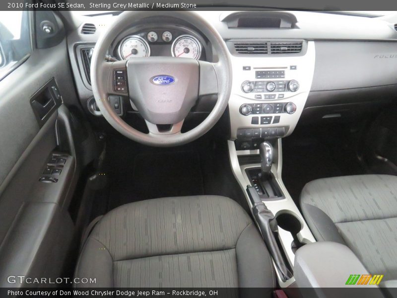 Sterling Grey Metallic / Medium Stone 2010 Ford Focus SE Sedan