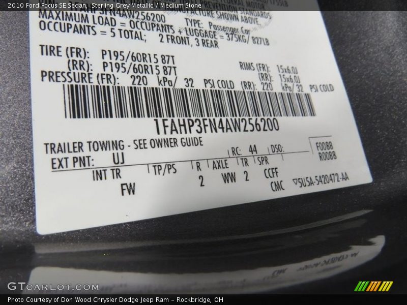 Sterling Grey Metallic / Medium Stone 2010 Ford Focus SE Sedan