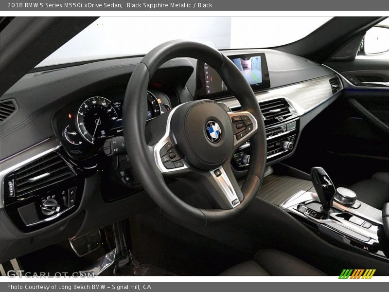 Black Sapphire Metallic / Black 2018 BMW 5 Series M550i xDrive Sedan