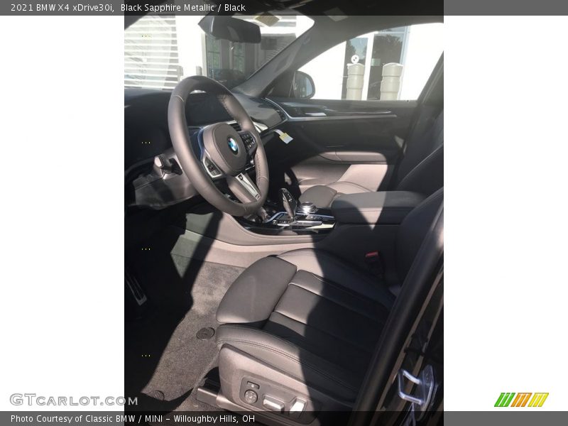 Black Sapphire Metallic / Black 2021 BMW X4 xDrive30i