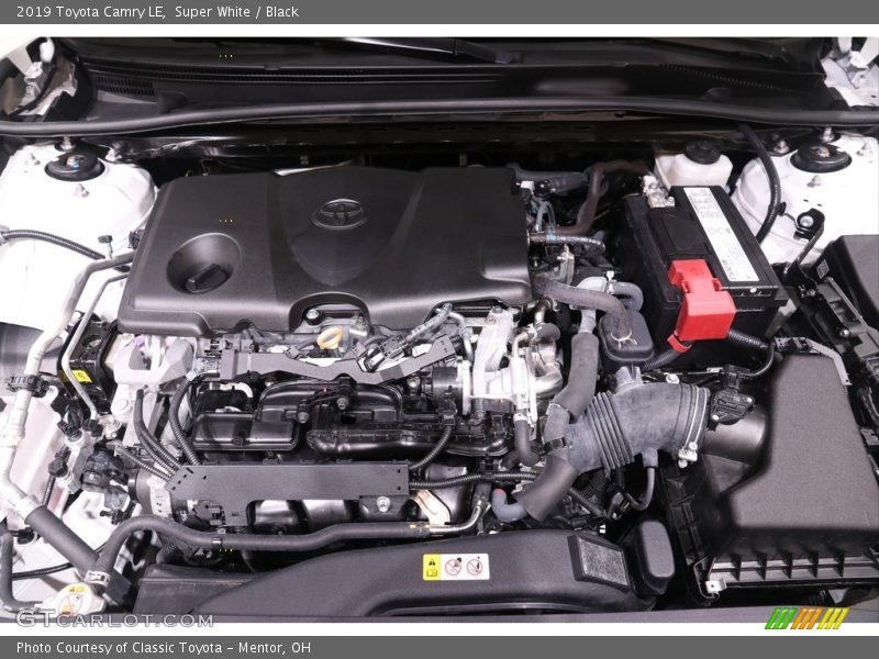 Super White / Black 2019 Toyota Camry LE