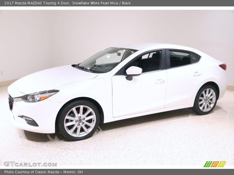 Snowflake White Pearl Mica / Black 2017 Mazda MAZDA3 Touring 4 Door