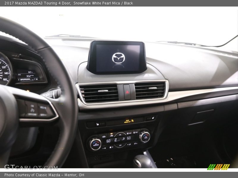 Snowflake White Pearl Mica / Black 2017 Mazda MAZDA3 Touring 4 Door