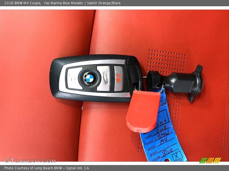 Yas Marina Blue Metallic / Sakhir Orange/Black 2018 BMW M4 Coupe