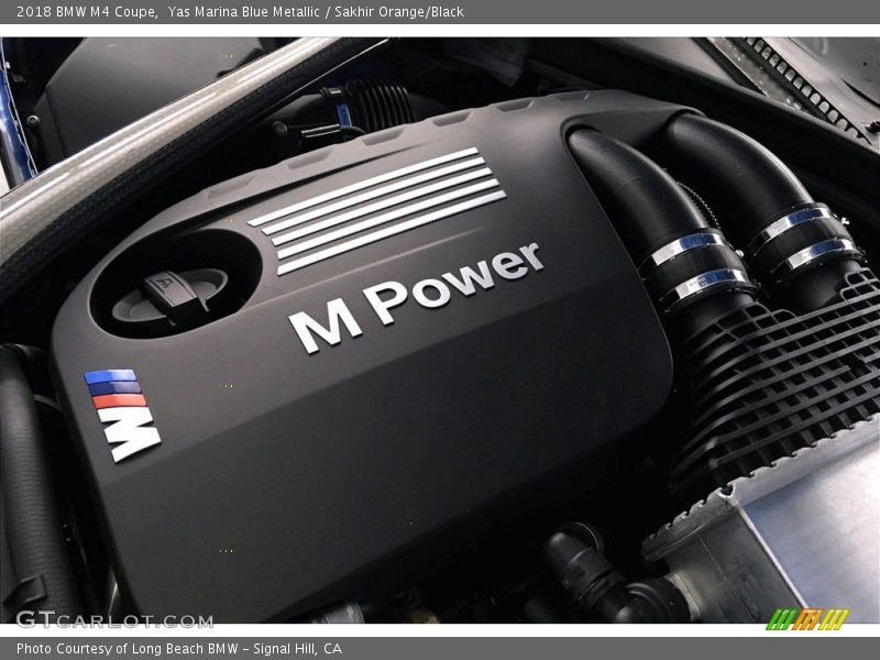Yas Marina Blue Metallic / Sakhir Orange/Black 2018 BMW M4 Coupe