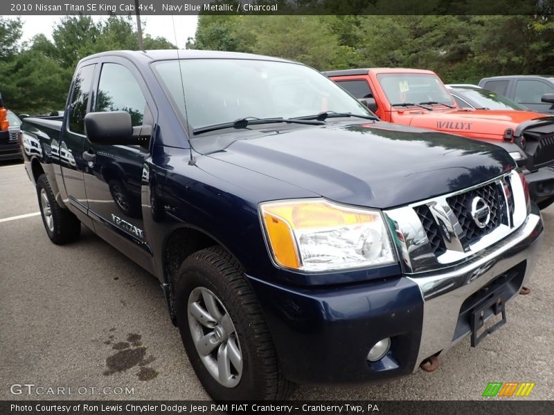 Front 3/4 View of 2010 Titan SE King Cab 4x4