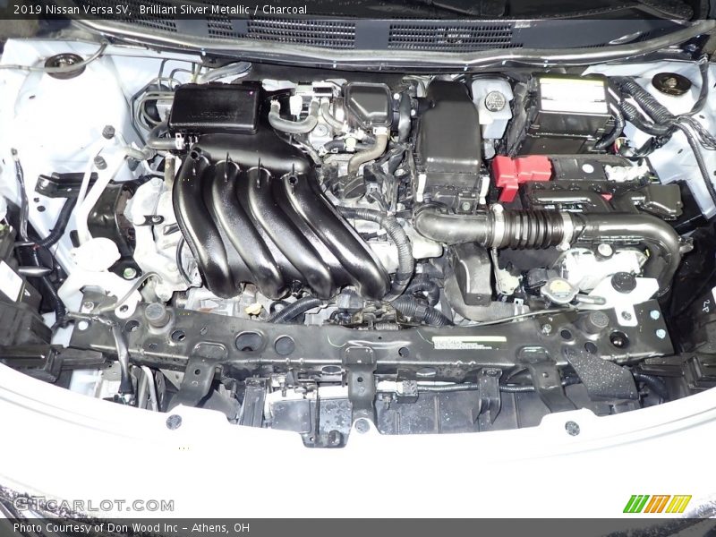 Brilliant Silver Metallic / Charcoal 2019 Nissan Versa SV