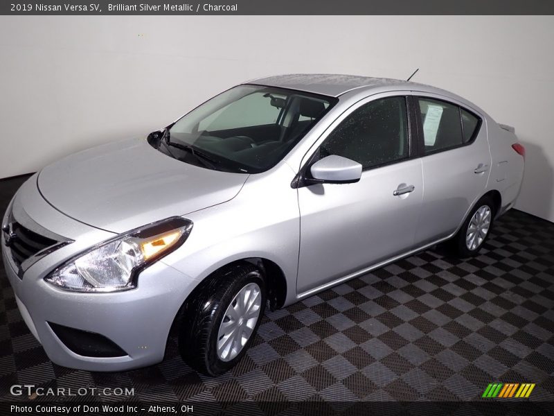 Brilliant Silver Metallic / Charcoal 2019 Nissan Versa SV