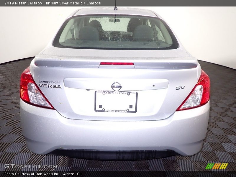 Brilliant Silver Metallic / Charcoal 2019 Nissan Versa SV
