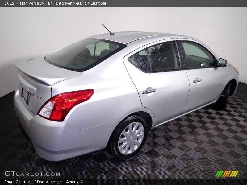 Brilliant Silver Metallic / Charcoal 2019 Nissan Versa SV