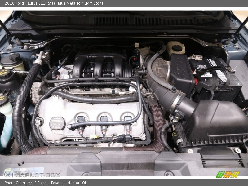 Steel Blue Metallic / Light Stone 2010 Ford Taurus SEL