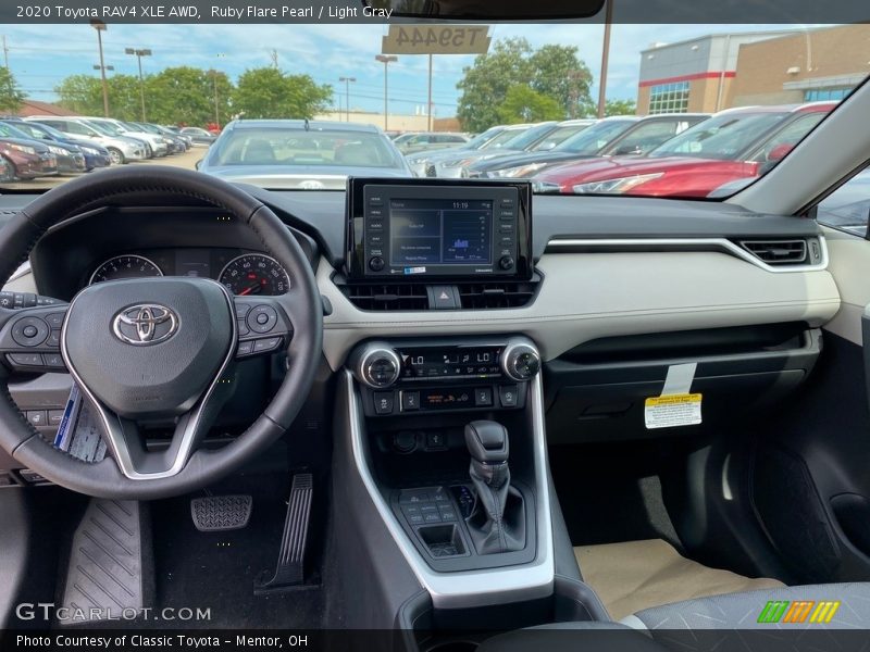 Ruby Flare Pearl / Light Gray 2020 Toyota RAV4 XLE AWD