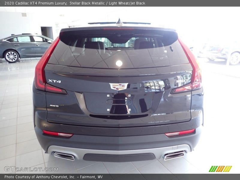 Stellar Black Metallic / Light Wheat/Jet Black 2020 Cadillac XT4 Premium Luxury