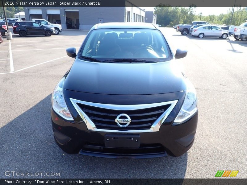Super Black / Charcoal 2016 Nissan Versa SV Sedan