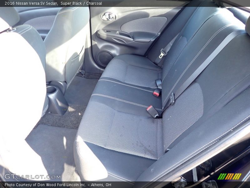 Super Black / Charcoal 2016 Nissan Versa SV Sedan
