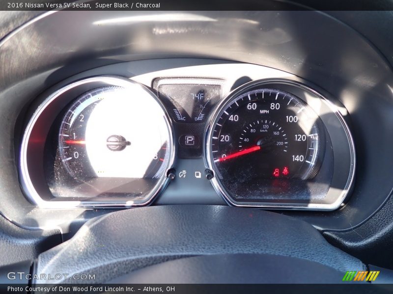 Super Black / Charcoal 2016 Nissan Versa SV Sedan