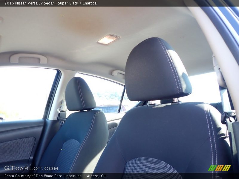 Super Black / Charcoal 2016 Nissan Versa SV Sedan
