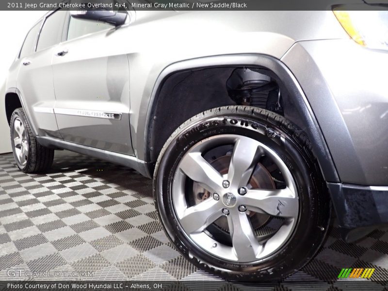 Mineral Gray Metallic / New Saddle/Black 2011 Jeep Grand Cherokee Overland 4x4