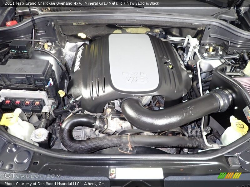 Mineral Gray Metallic / New Saddle/Black 2011 Jeep Grand Cherokee Overland 4x4