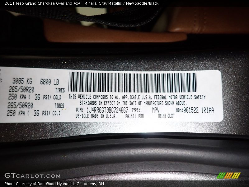 Mineral Gray Metallic / New Saddle/Black 2011 Jeep Grand Cherokee Overland 4x4