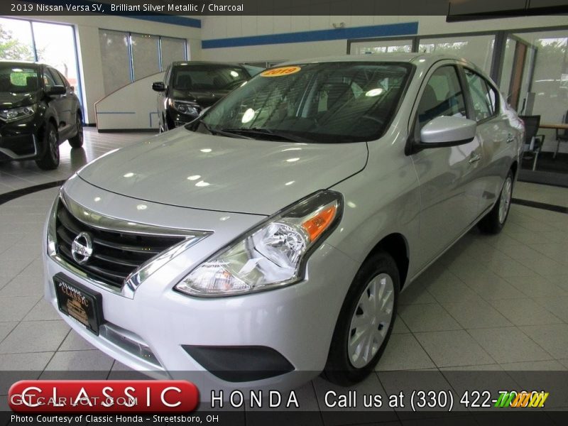 Brilliant Silver Metallic / Charcoal 2019 Nissan Versa SV