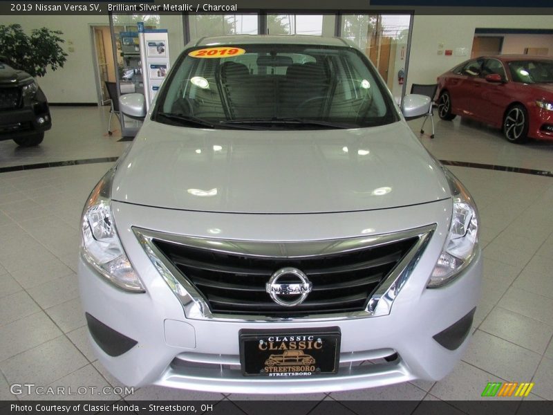 Brilliant Silver Metallic / Charcoal 2019 Nissan Versa SV