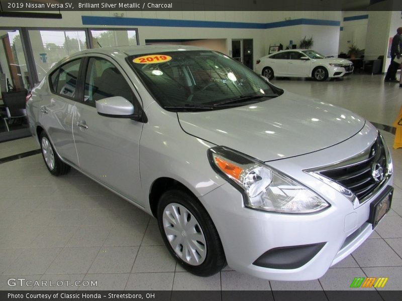 Brilliant Silver Metallic / Charcoal 2019 Nissan Versa SV
