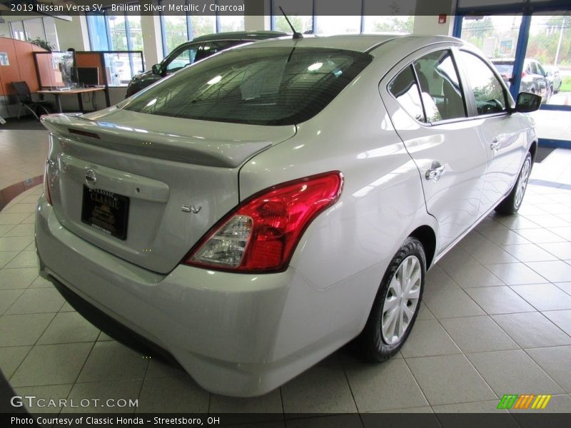 Brilliant Silver Metallic / Charcoal 2019 Nissan Versa SV