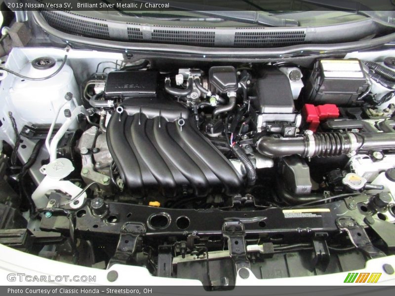 Brilliant Silver Metallic / Charcoal 2019 Nissan Versa SV