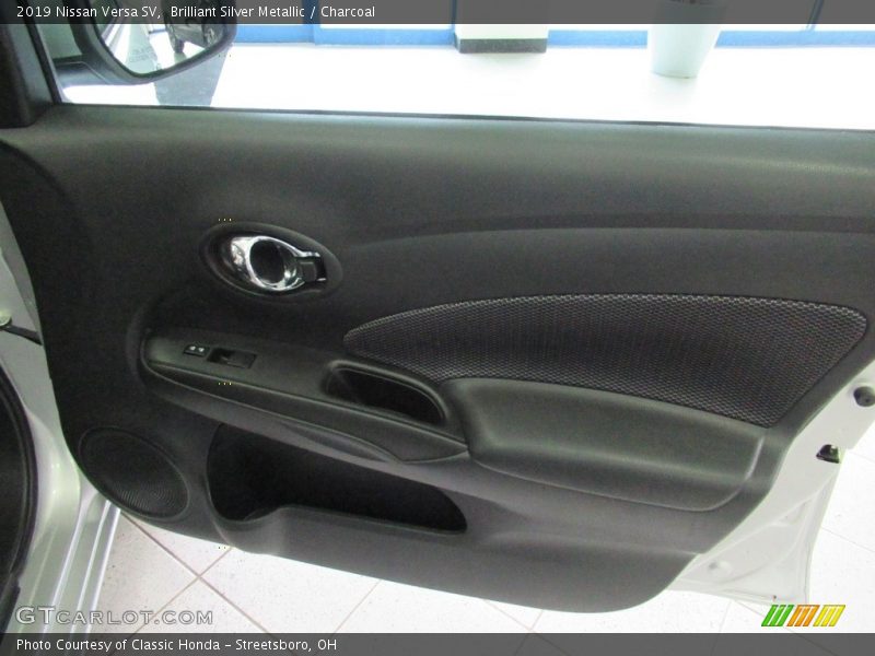 Brilliant Silver Metallic / Charcoal 2019 Nissan Versa SV