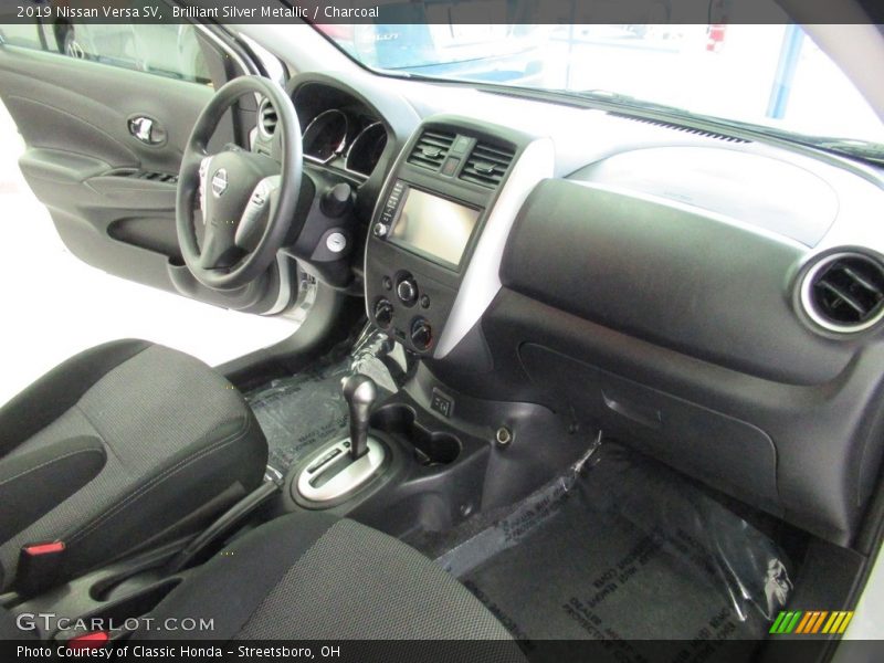 Brilliant Silver Metallic / Charcoal 2019 Nissan Versa SV
