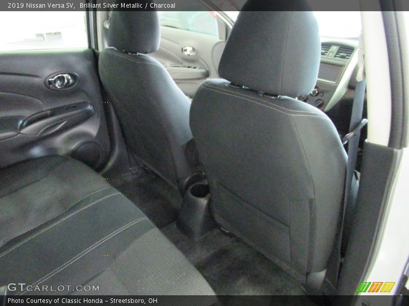 Brilliant Silver Metallic / Charcoal 2019 Nissan Versa SV