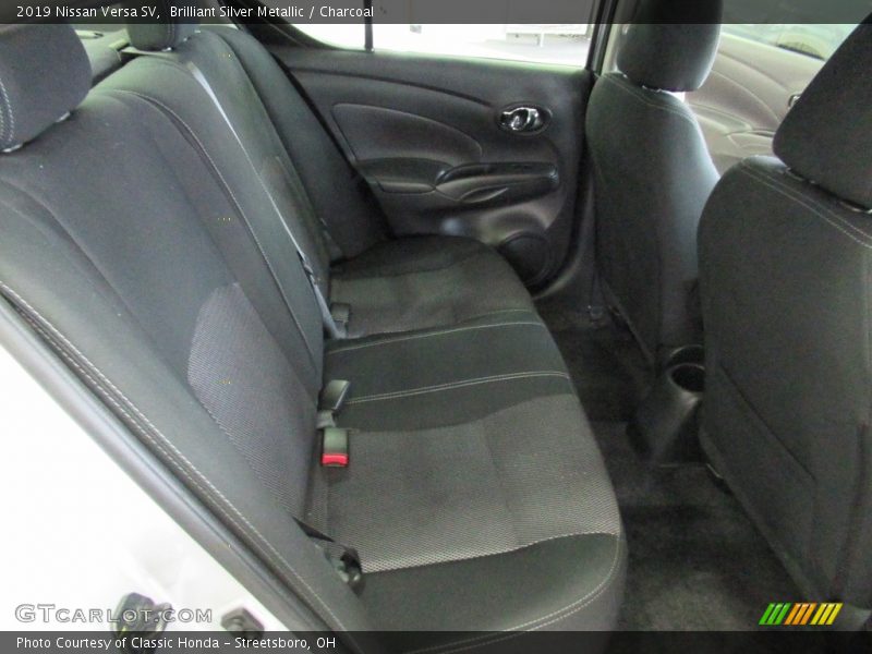 Brilliant Silver Metallic / Charcoal 2019 Nissan Versa SV