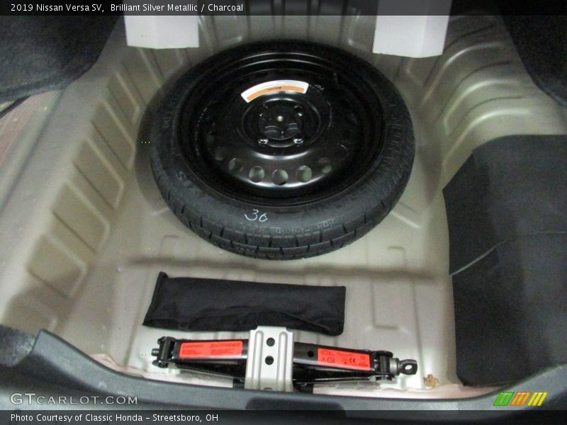 Brilliant Silver Metallic / Charcoal 2019 Nissan Versa SV