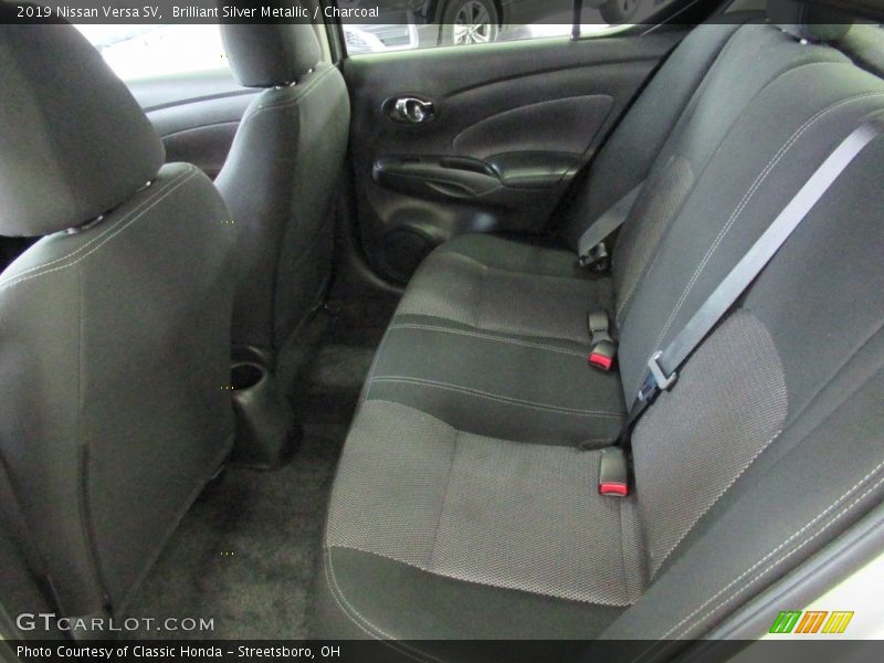 Brilliant Silver Metallic / Charcoal 2019 Nissan Versa SV