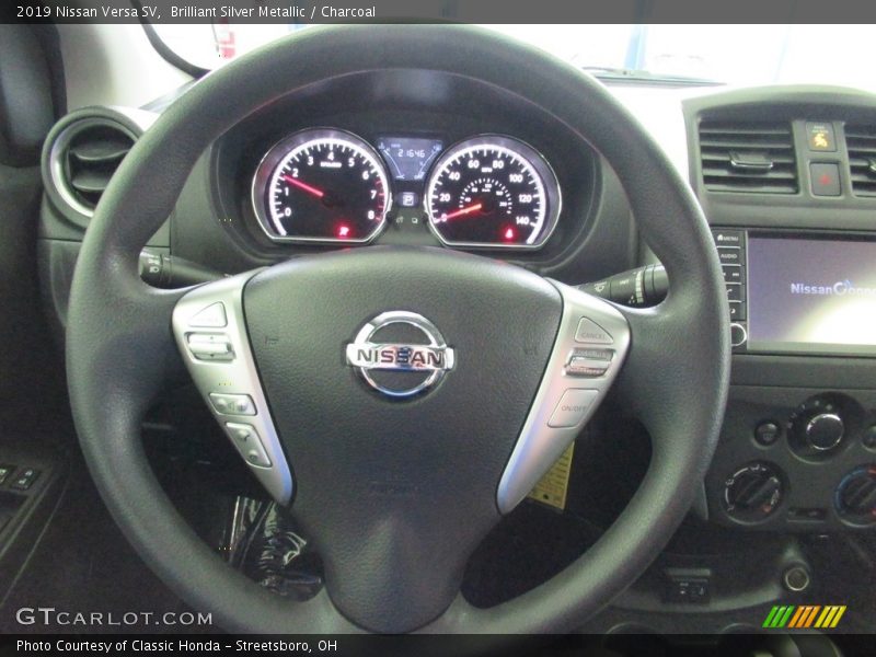 Brilliant Silver Metallic / Charcoal 2019 Nissan Versa SV