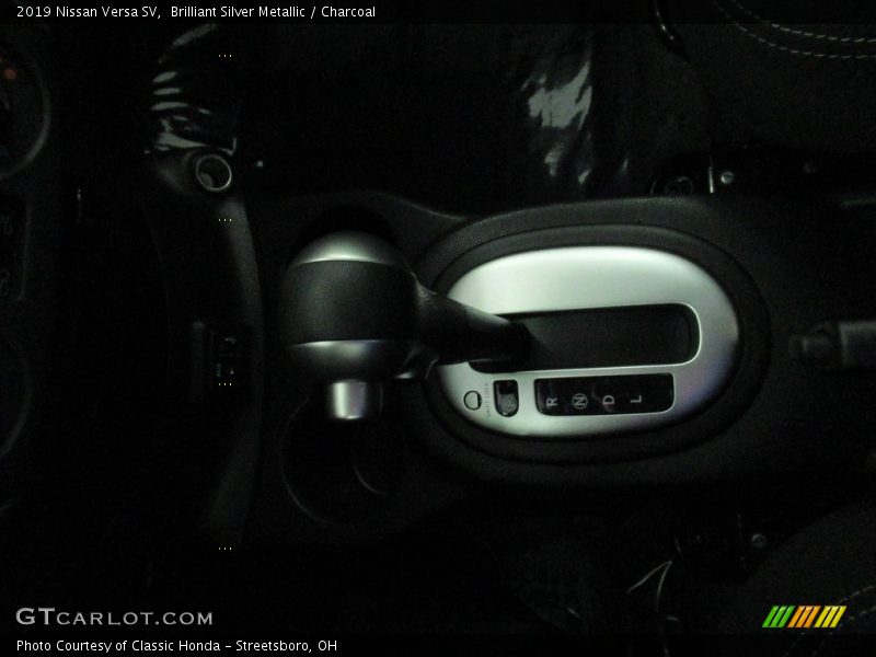 Brilliant Silver Metallic / Charcoal 2019 Nissan Versa SV