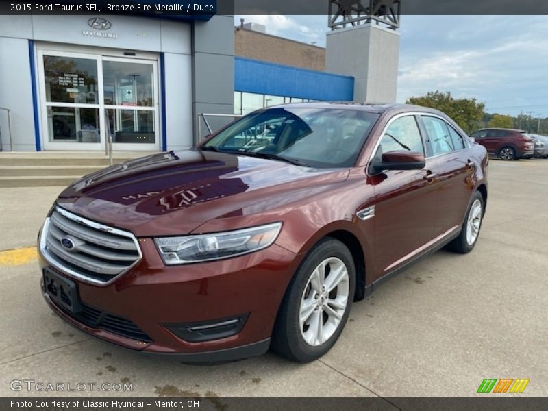 Bronze Fire Metallic / Dune 2015 Ford Taurus SEL