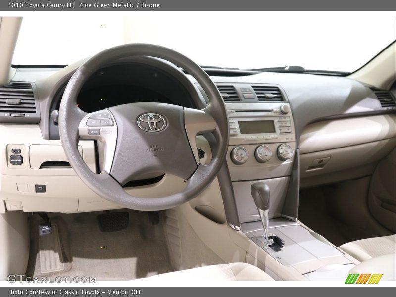 Aloe Green Metallic / Bisque 2010 Toyota Camry LE
