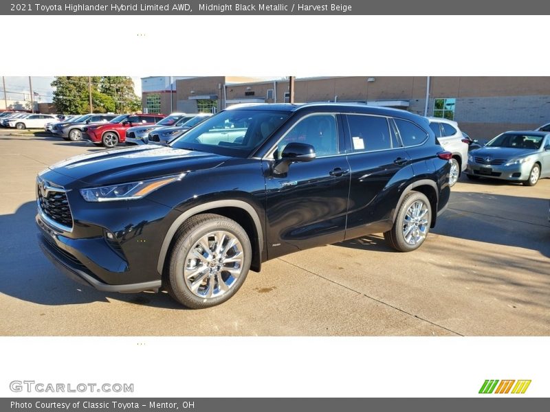 Midnight Black Metallic / Harvest Beige 2021 Toyota Highlander Hybrid Limited AWD