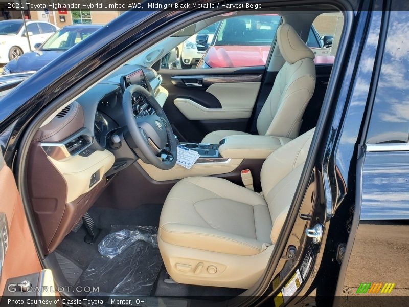 Midnight Black Metallic / Harvest Beige 2021 Toyota Highlander Hybrid Limited AWD