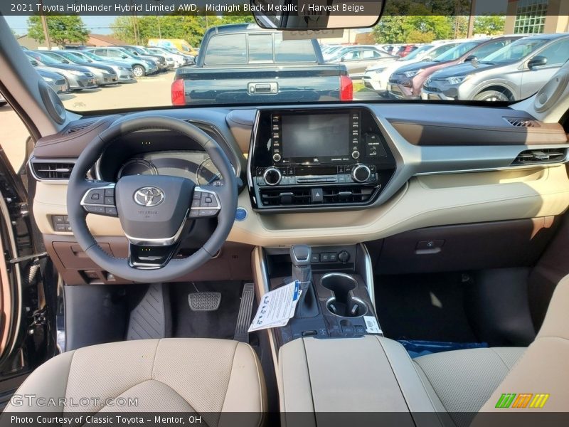 Midnight Black Metallic / Harvest Beige 2021 Toyota Highlander Hybrid Limited AWD