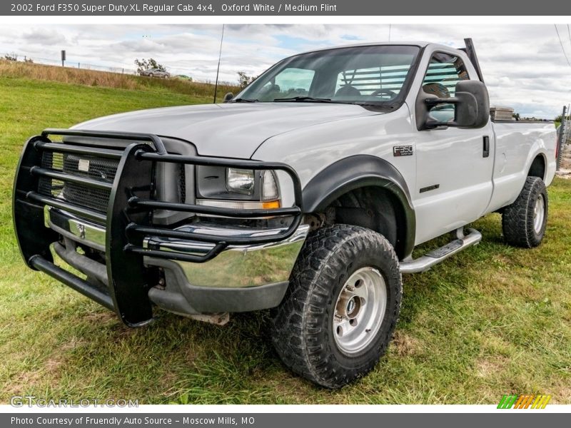 Front 3/4 View of 2002 F350 Super Duty XL Regular Cab 4x4