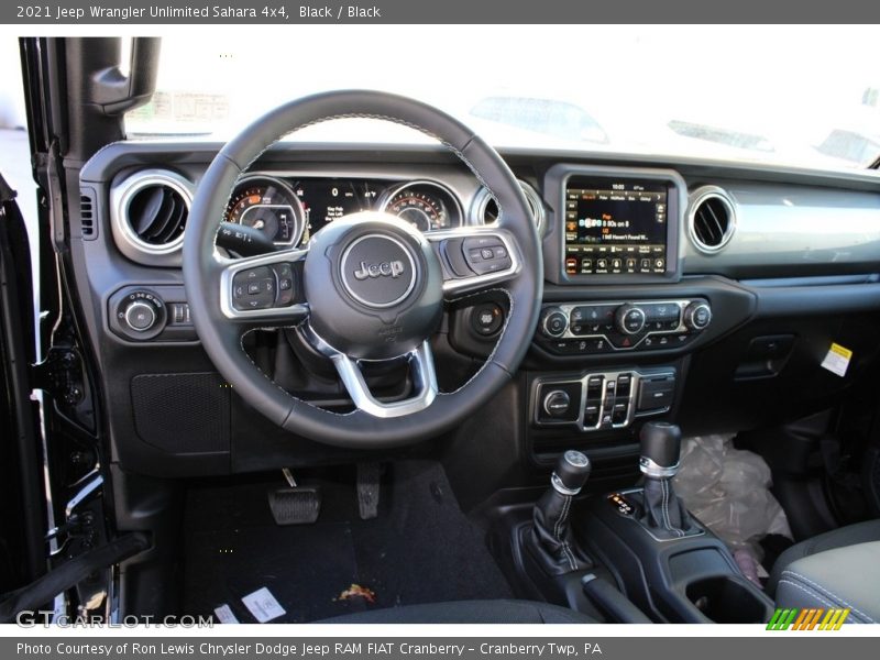 Black / Black 2021 Jeep Wrangler Unlimited Sahara 4x4