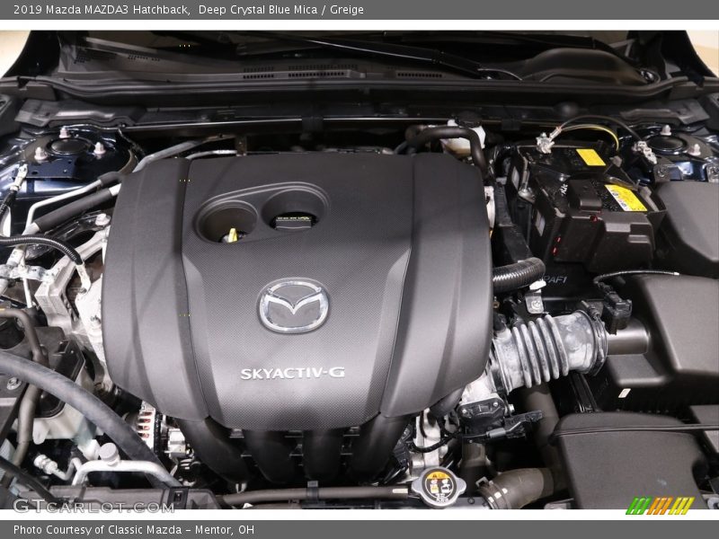 Deep Crystal Blue Mica / Greige 2019 Mazda MAZDA3 Hatchback