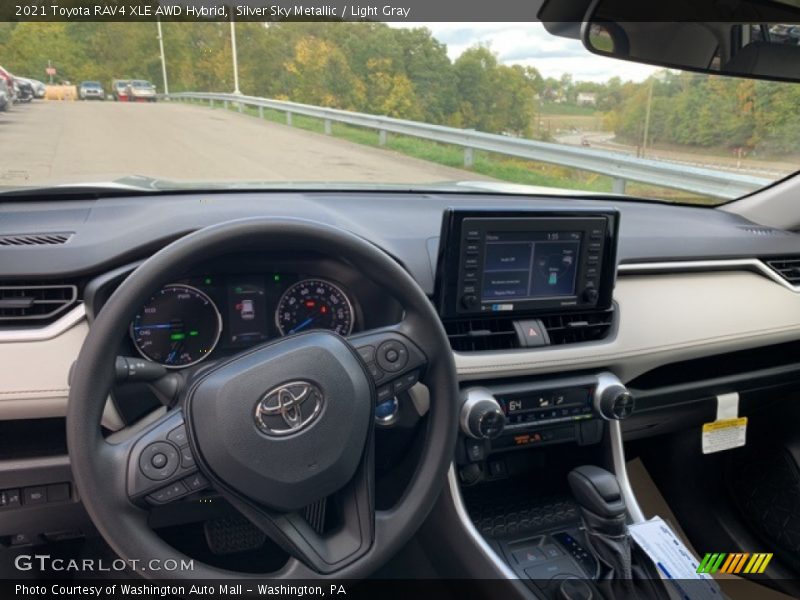 Silver Sky Metallic / Light Gray 2021 Toyota RAV4 XLE AWD Hybrid