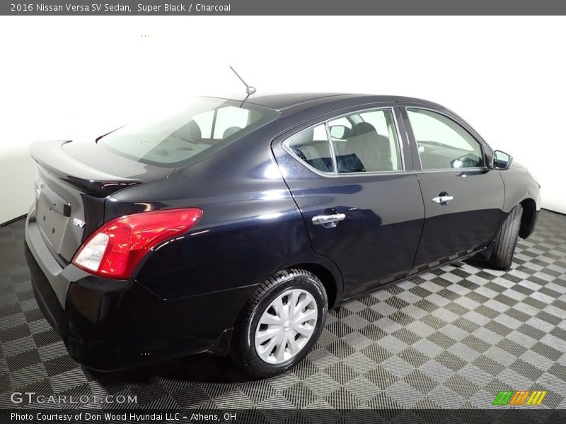 Super Black / Charcoal 2016 Nissan Versa SV Sedan