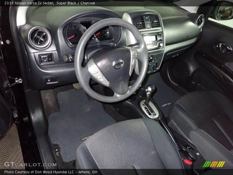 Super Black / Charcoal 2016 Nissan Versa SV Sedan