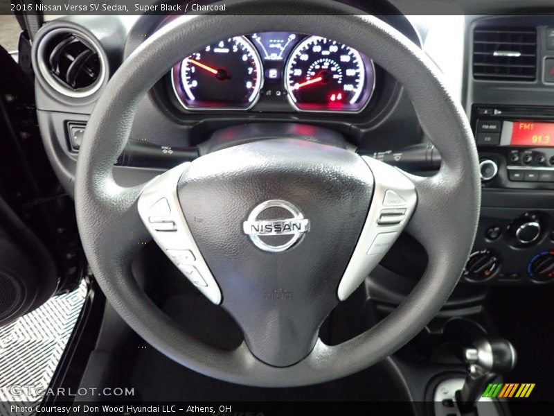 Super Black / Charcoal 2016 Nissan Versa SV Sedan